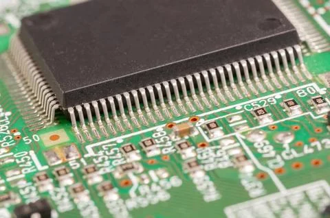 Close-up view of a circuit board with electronic components and connectors. Stock Photos