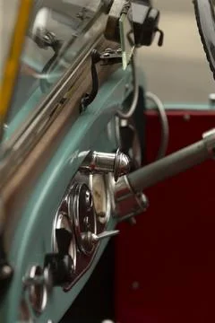Close view of classic car interior with chrome dashboard details Foto stock