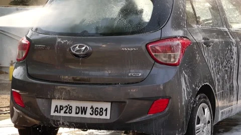 Close view of cleaning backside of car with high pressure water Stock-Footage 148264684