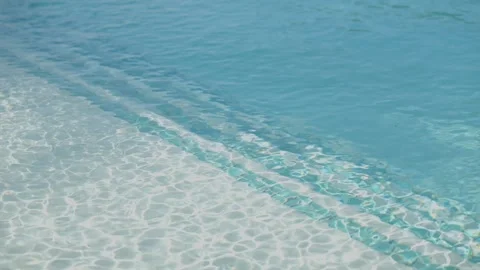 Close up view of clear blue water with visible tiled ledge in swimming pool Stock-Footage 276027161