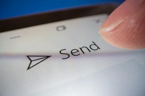 Close-up view of clicking the send button in an email app 스톡 사진