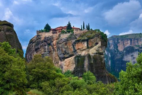 Close view of clifftop Eastern Orthodox monastery of Holy Trinity or Agia Triada Stock Photos