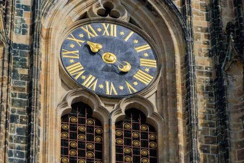 Close up view of clock on the tower of St. Vitus Cathedral in Prague, Czech.. Stock Photos