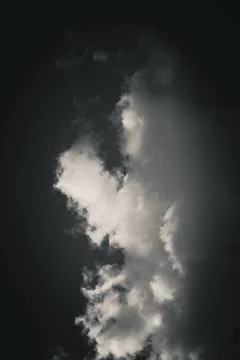 Close-up view of clouds in the sky, with sunlight creating contrasts that g.. Stock Photos