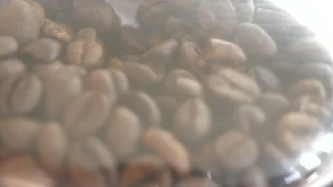 A close up view of coffee beans grinding process. Stock Footage 151440759