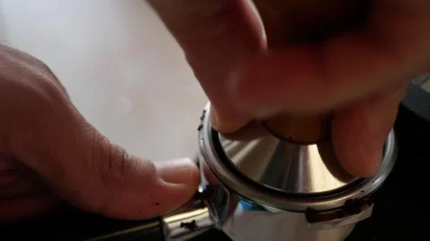 Close up view to coffee bucket full with grounded coffee bean while using t.. Stock Footage 284211198
