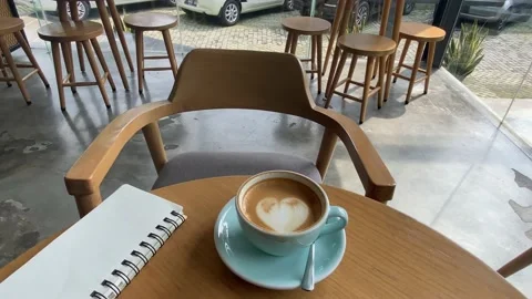 A close up view of coffee latte in a green cup on the table. a view in the cafe. Stock Footage 214114740