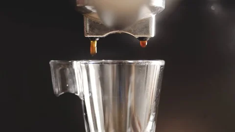 A close up view of a coffee machine making an espresso coffee. Stock Footage 92280149