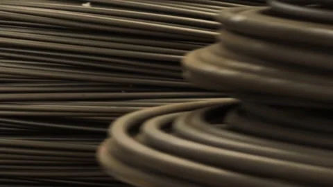 A close-up view of coiled industrial cables arranged in parallel rows Stock-Footage 292862041