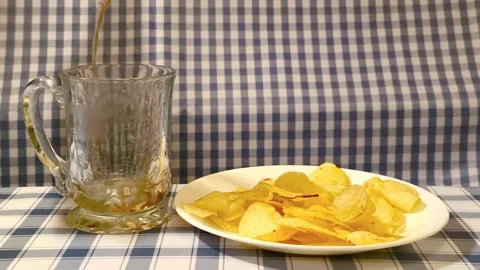 Close up view of cola soda drink pouring into a clear glass cup with plate .. Video stock 318127232