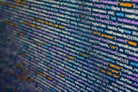 Close-up view of colorful computer code on screen, showing if statements an.. 写真素材
