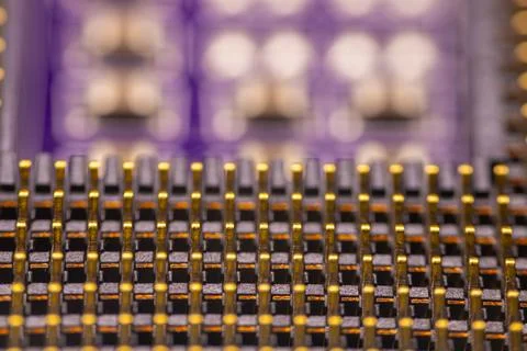 Close-up view of a complex electronic circuit board featuring intricate pat.. Stock Photos
