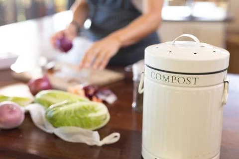 Close up view of compost bin on the kitchen counter top at home Stock Photos
