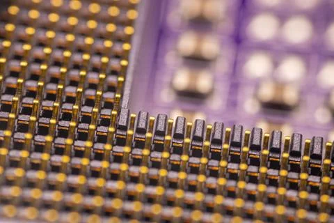 Close-up view of a computer circuit board featuring intricate patterns of m.. Stock Photos