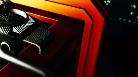 Close view of a computer component in a dark setting with bright accents Stock Footage 345003737