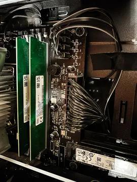 Close-up view of computer components including RAM modules and an M.2 SSD car Stock Photos