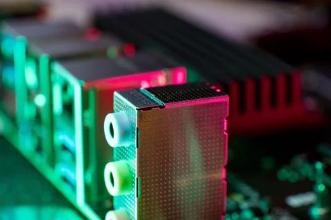 Close-up view of computer hardware components with colorful lighting effects Stock Photos