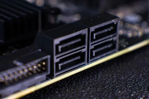 Close-up view of computer hardware connections on a motherboard in a technology Stock Photos