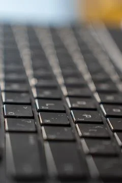Close-Up View of a Computer Keyboard with Focus on Keys and Texture for Tec.. Stock Photos