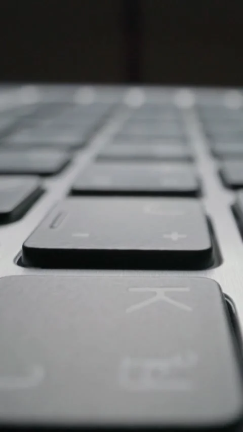 Close-up view of computer keyboard. Macro soft focus dolly shot Stock Footage 295126913