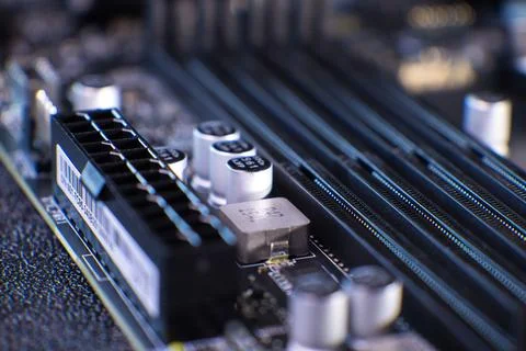 Close view of a computer motherboard with various components and slots for 库存照片