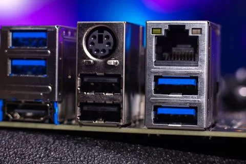 Close view of computer ports including USB, Ethernet, and audio connections on a Stock Photos