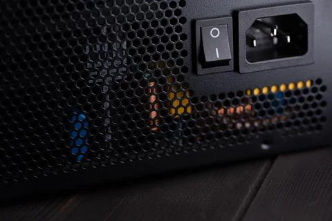 Close-up view of a computer power supply showing the power switch and inter.. Stock Photos