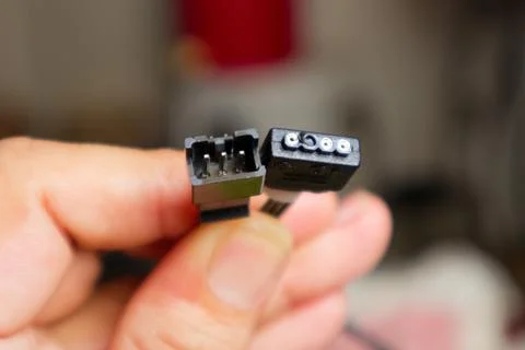Close-up view of a Computer SATA Cable Connector, showcasing precision and .. Stock Photos