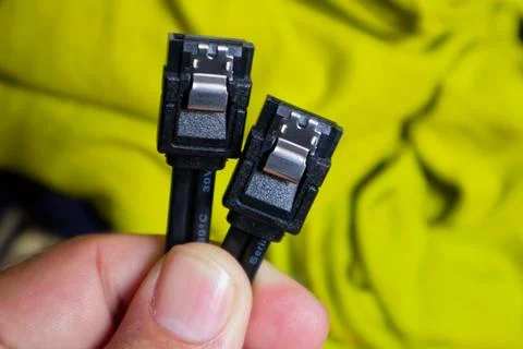 Close-up view of a Computer SATA Cable Connector, showcasing precision and .. Stock Photos