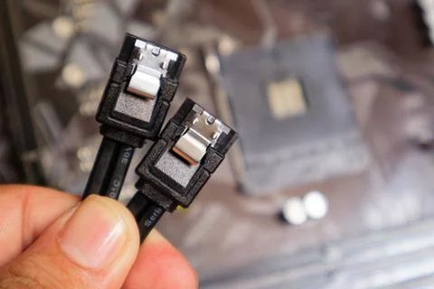 Close-up view of a Computer SATA Cable Connector, showcasing precision and .. Stock Photos