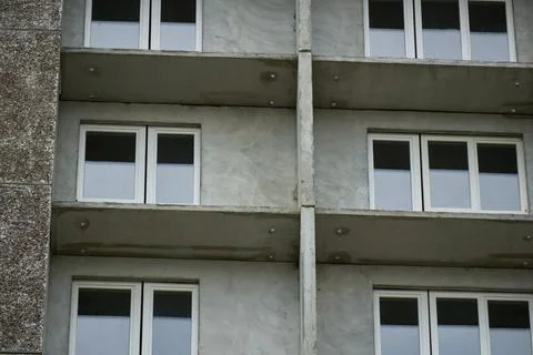 Close Up View of Concrete Panel Balconies and Installed Plastic Windows Stock Photos