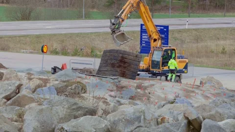 Close up view of construction imploding works on rocky terrain. Stock Footage 153858497