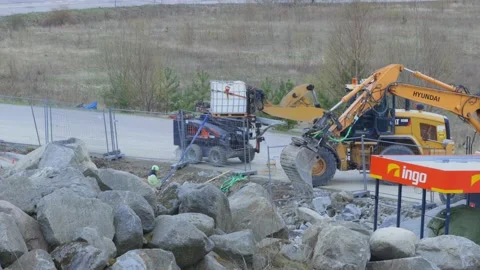 Close up view of construction imploding works on rocky terrain. Stock Footage 154320166