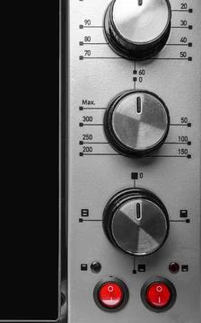 A close-up view of the control panel of an oven or microwave Stock Photos
