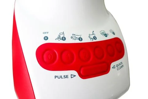 Close-up view of the control panel on a red and white electric blender Stock Photos