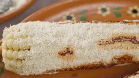 A close up view of cooked corn to be prepared with mayonnaise Cheese and chilli Stock Footage 280316918