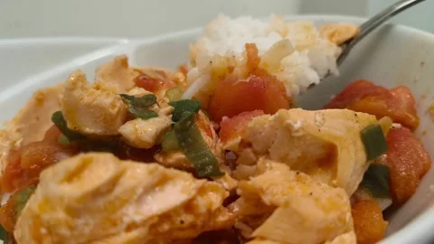 Close-up view of cooked grilled roasted hot warm steaming salmon rice tomato Stockbeeldmateriaal 318259648