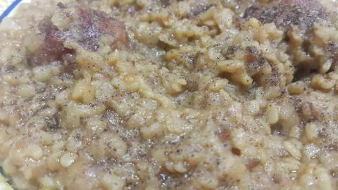 A close up  view of Cooked white rice called Kichra served with meatball in t Stock Photos
