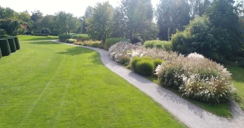 Close-up view from copter of the charming colourful blooming Wertwiesenpark in Stock Footage 87552764