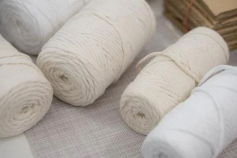 An up-close view of cotton spools used for macrame and craft-making, focusi.. Stock Photos