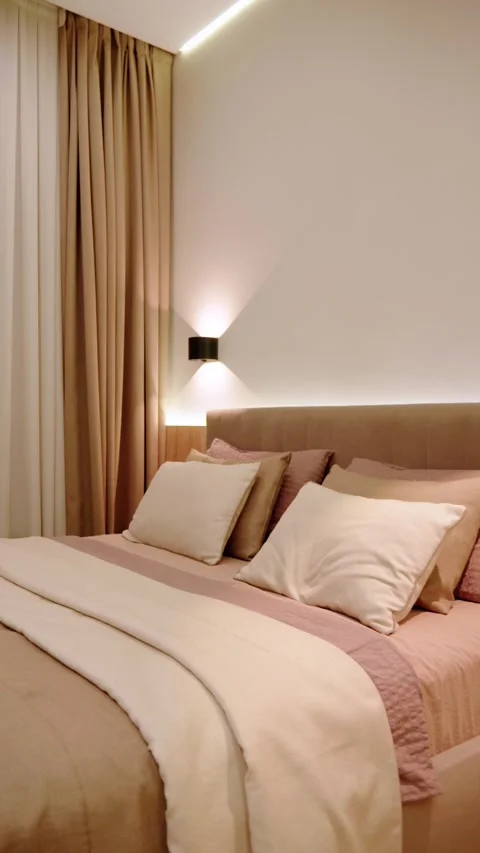 Close View of Cozy Modern Bed with Layered Pillows 動画素材 342861499