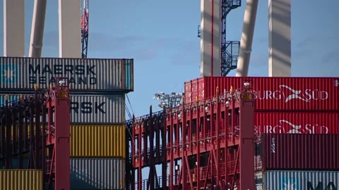 Close up view of cranes loading and unloading carrier ship at Port of Koper Stock Footage 161012445