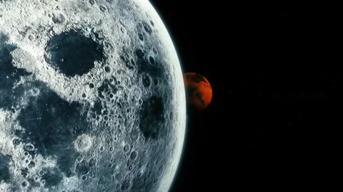 Close view of a cratered moon with a red planet in the background against a.. Stock Footage 340383303