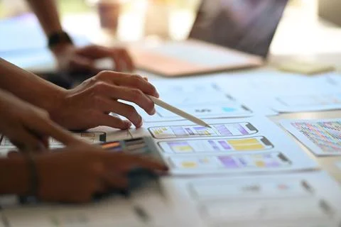 Close up view creative people planning application process development prototype Stock Photos