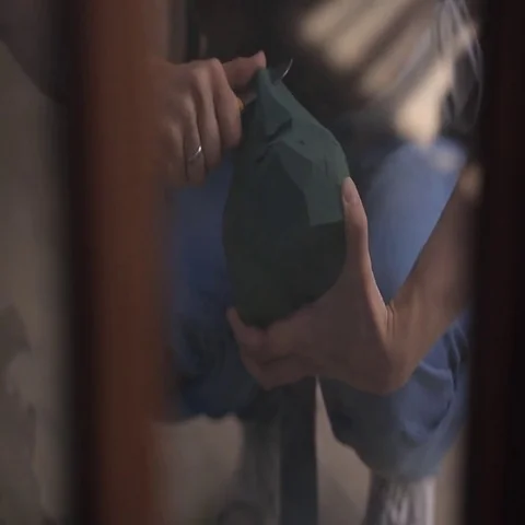Close up view of creative worker making handmade composition Stock Footage
