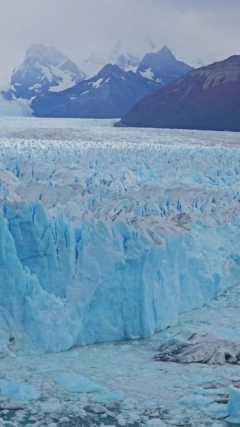 Close View Of Crevassed Glacier Surface And Blue Ice Walls, Argentina – Vertical Stock Footage 306470500