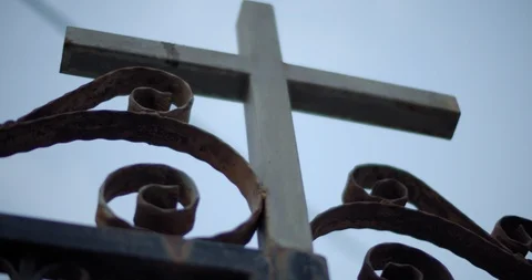 Close up view of cross in front of the catholic church entrance, rack focus Stock Footage 123694986