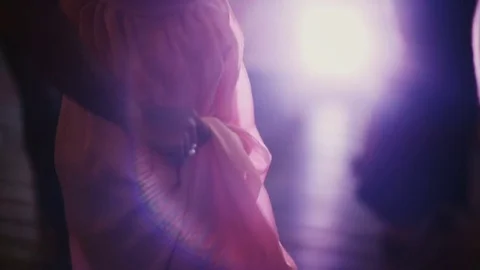 Close-up view of crowd dancing at night club with lighting. Group of people in Stock Footage 75791881