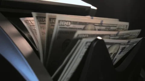 Close up view of Currency counting machine. Counter machine with US mo 스톡 동영상 306384168