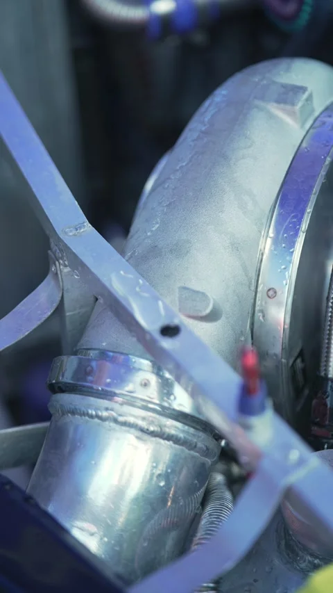 Close up view of custom car turbo ice water spray system. Stock Footage 342441712